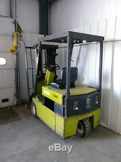 CLARK TM-15 FORK LIFT TRUCK With YAUSA 2000 PLUS BATTERY CHARGER NO BATTERIES